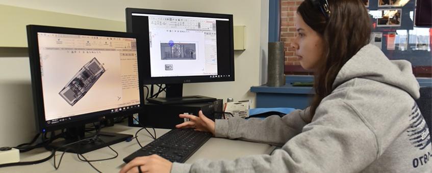 Design Engineering student working on a computer-based assignment.